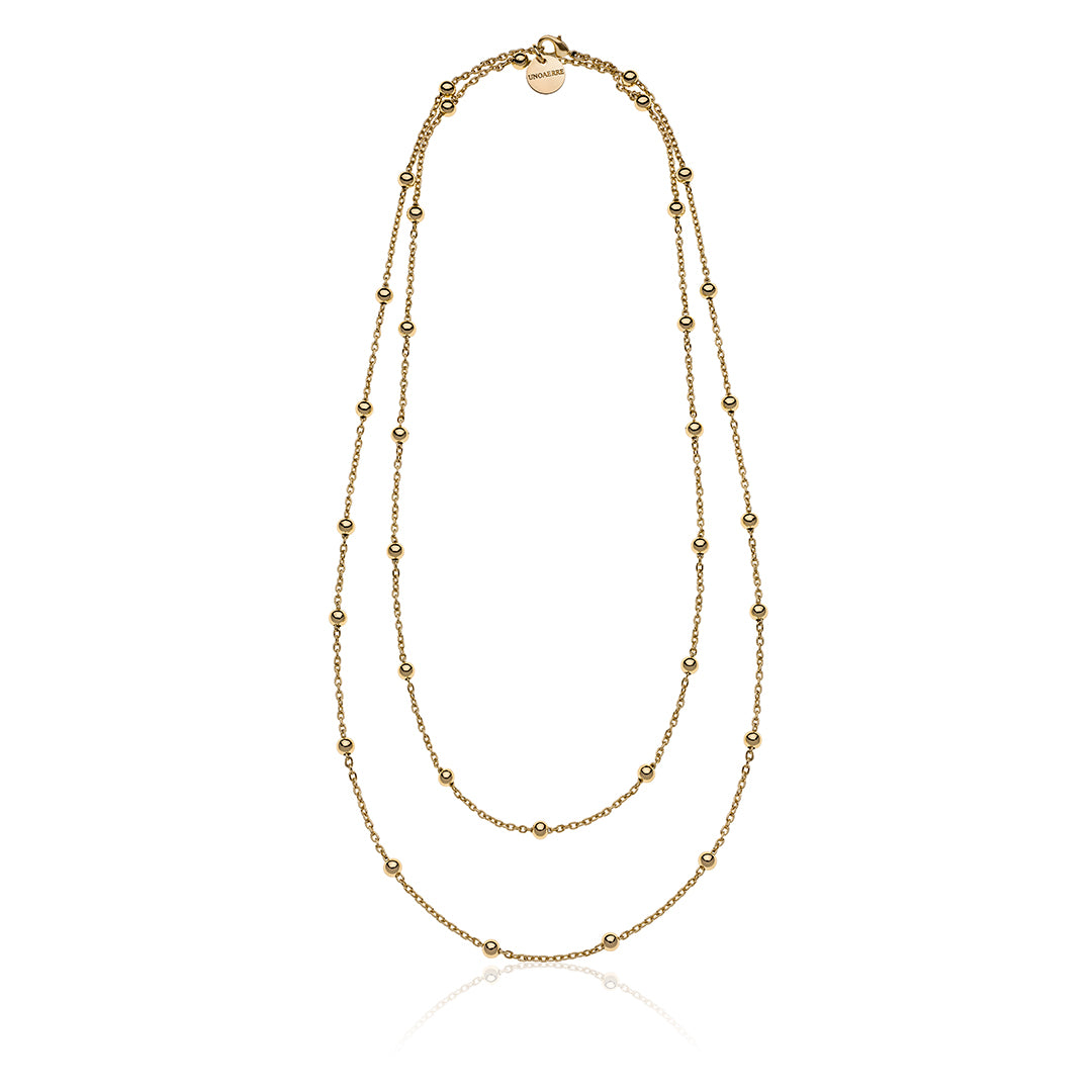 Collana in bronzo dorato con sfere