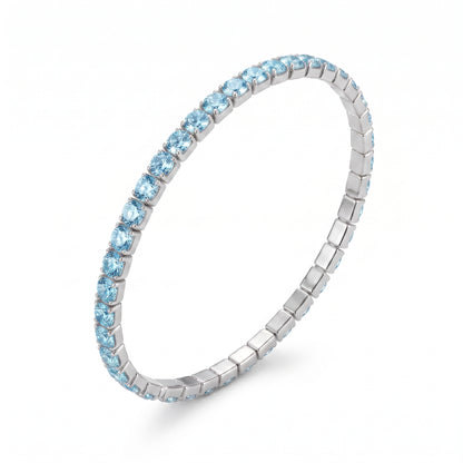 Bracciale Tennis Elastico Color Argento con Strass Celesti Acquamarina