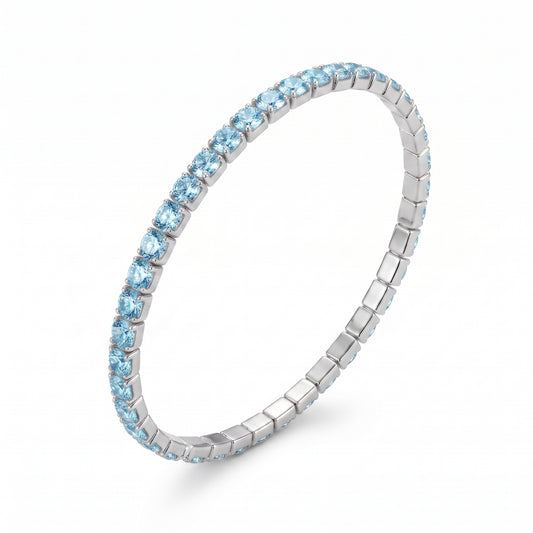 Bracciale Tennis Elastico Color Argento con Strass Celesti Acquamarina