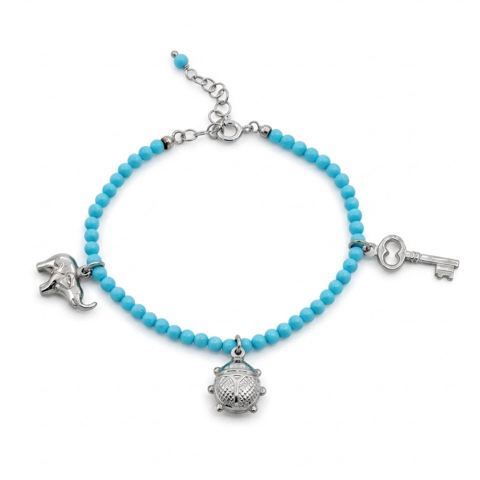 Bracciale in Sfere di Turchese con Pendenti Portafortuna in Argento 925
